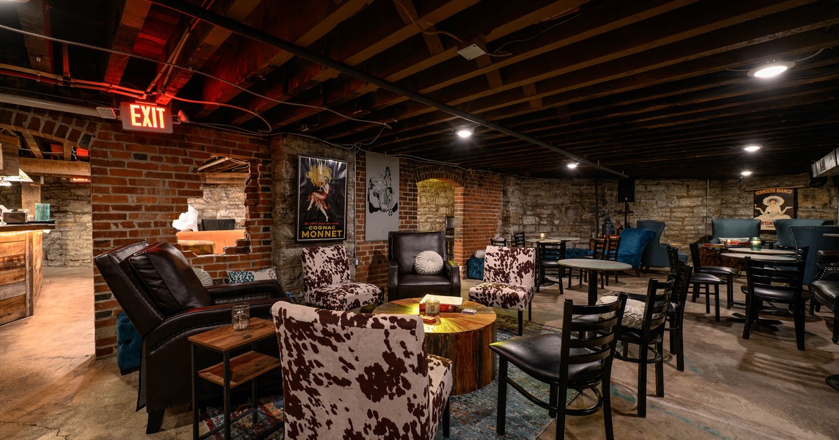 Interior, seating and lounge area, various types of armchairs surrounding the coffee table