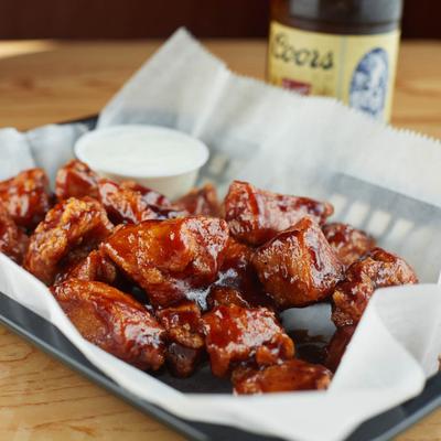 Boneless BBQ chicken wings, with dip.