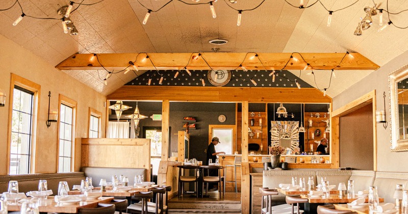 Interior seating area, tables ready for guests