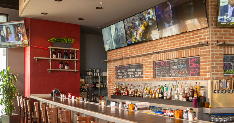 Bar area, bottles in the back