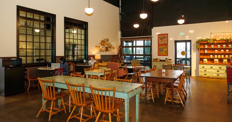 Interior, seating area with few guests in the back