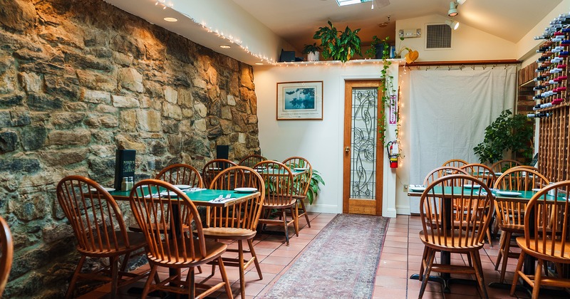 Interior dining area with set tables ready for guests