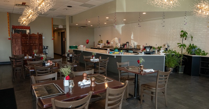 Spacious and modern dining area of an Indian restaurant