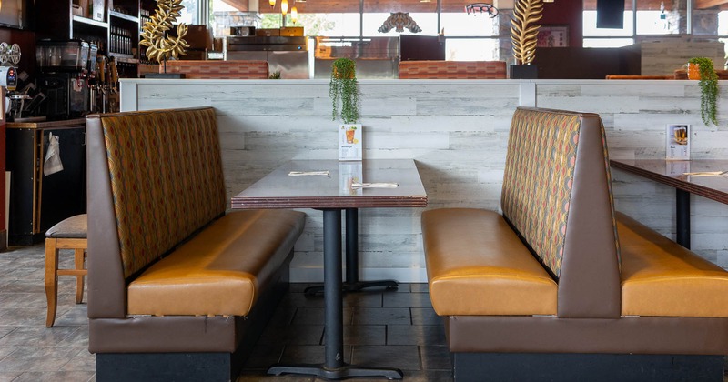 Interior, restaurant booth near wall