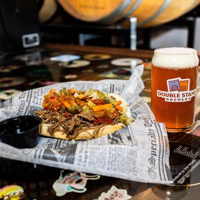 Italian beef sandwich and a beer.