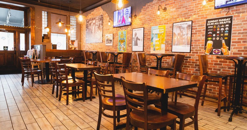 Interior, seating area, TVs and pictures on the wall