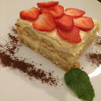 Tres Leches cake, topped with strawberries.