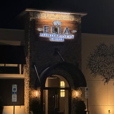 Elia Mediterranean Grille exterior at night.