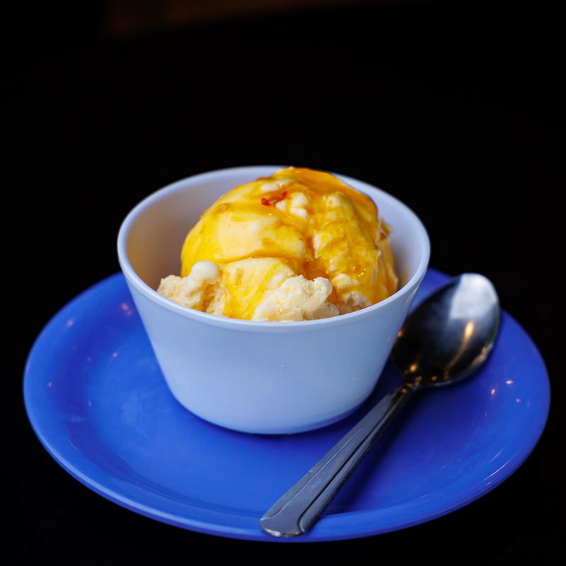Mango Habanero Sauce over Vanilla Ice Cream photo