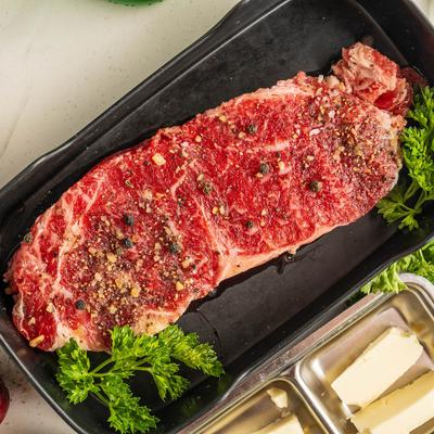 Seasoned New York Strip Steak.