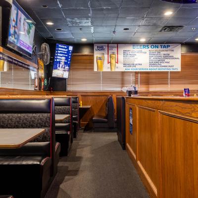 Raised booth section at Gatsby's pub and grill is 21 and under friendly. Booths fit up to 4 guests..