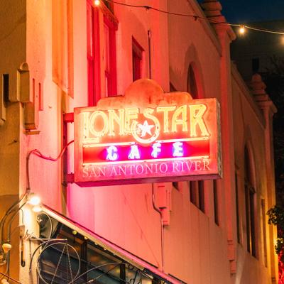 Glowing neon restaurant signage.