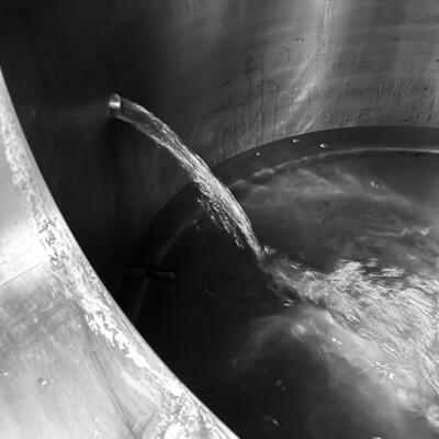 Water filling into a brew tank.