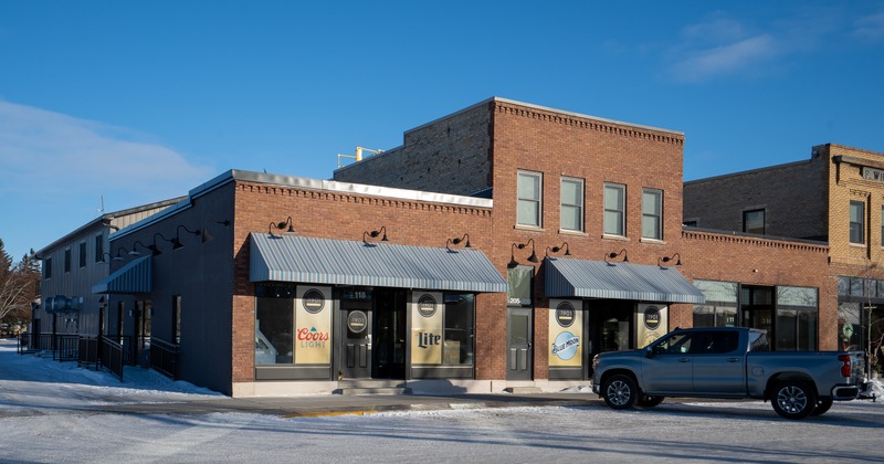 Exterior, front view to restaurant, entrance, sign above