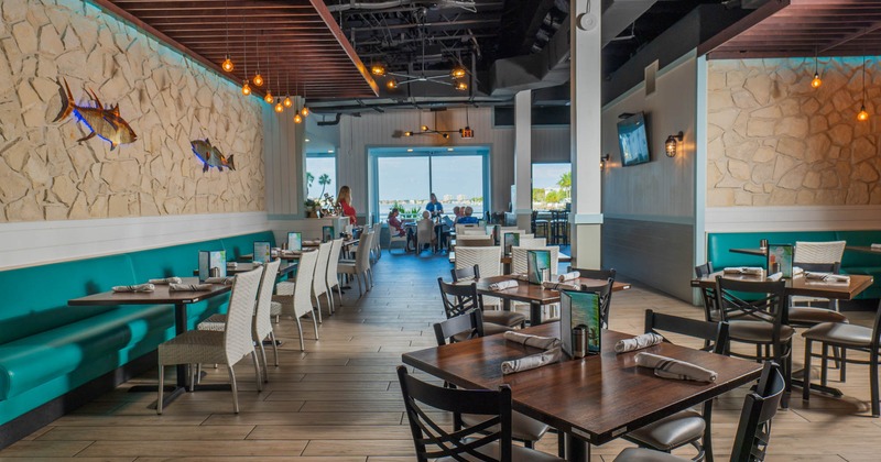 Interior, wide view of dining area, tables and chairs