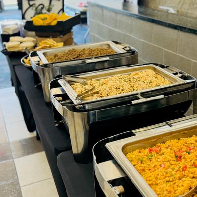 Food in large serving containers.