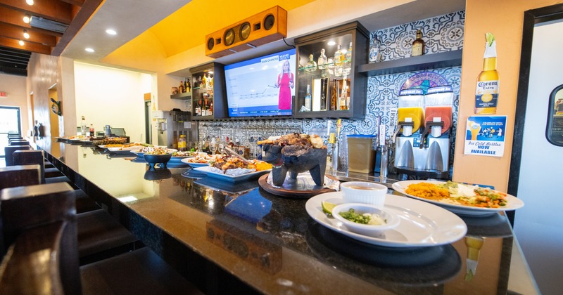 Plated food on a restaurant bar