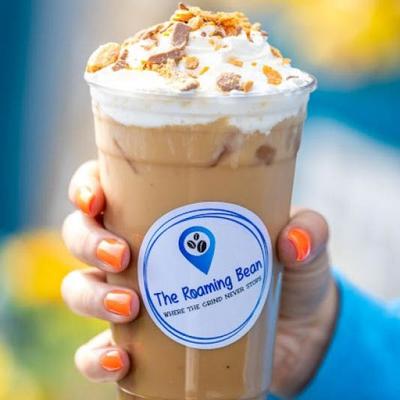 Iced Coffee, topped with whipped cream and nuts.