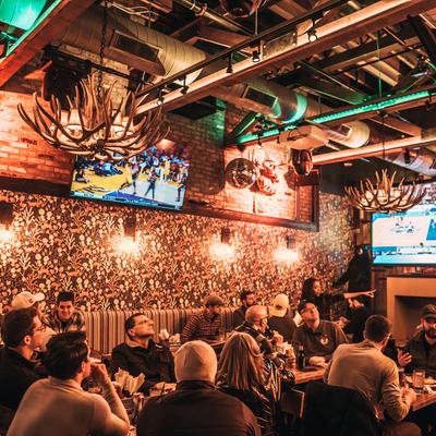 Interior, guests enjoying drinks, having fun