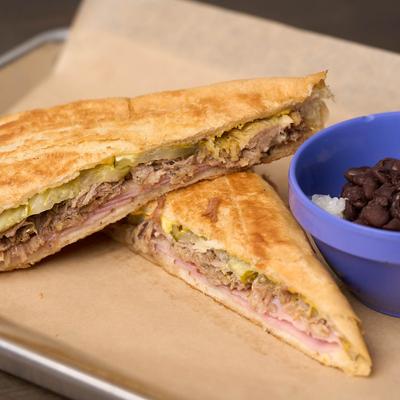 Cuban Sandwich with a side of Rice and Beans.