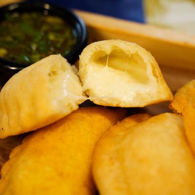 Cheese stuffed empanadas.