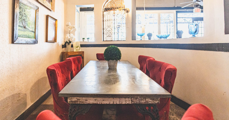 Table with red armchairs