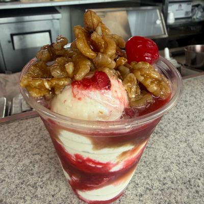 Strawberry sundae with wet nuts, hold the whip cream..