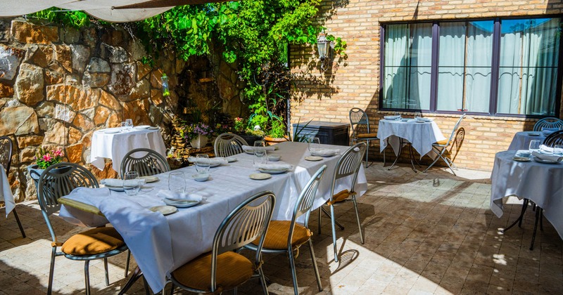 Outdoor dining area, table and chairs