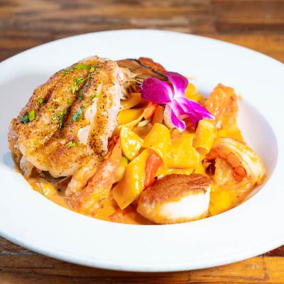 Delicious pasta with decorative flower