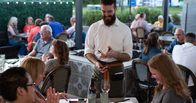Employee tending to customers