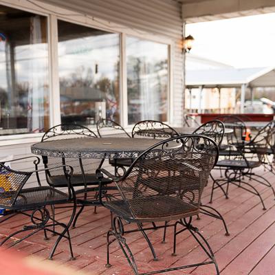 Tables and chairs outside.