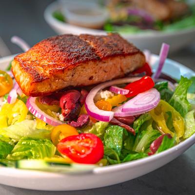 Greek salad and grilled salmon