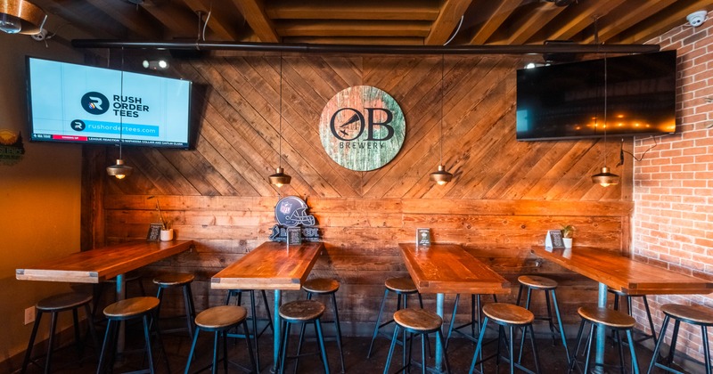 Interior, tables with chairs near the wall