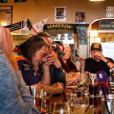 People drinking at the bar.
