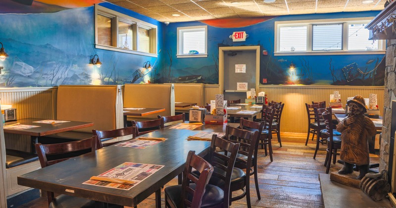 Interior, seating area, tables ready for guests