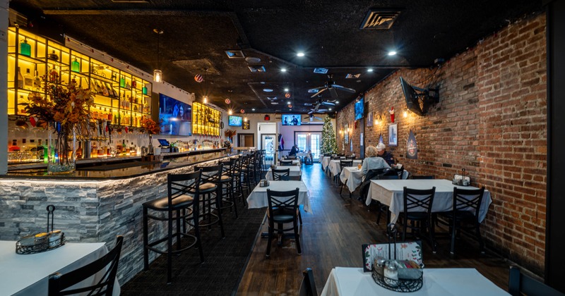 Interior, set tables and chairs ready for guests