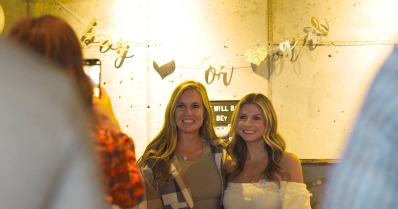Interior, brick wall, guests at the bar