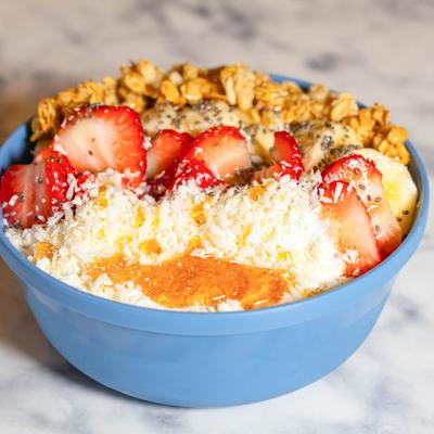 Acai Bowl with banana, strawberry, coconut, granola.