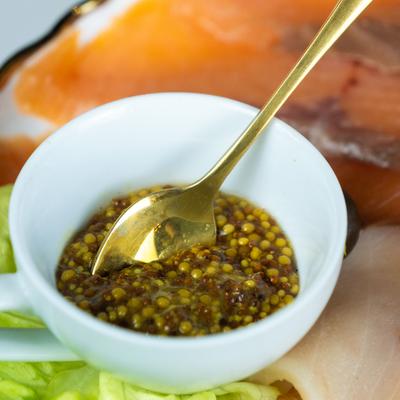 While grain mustard served on a fish platter.