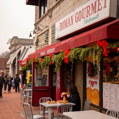 Exterior, tables by the front entrance.