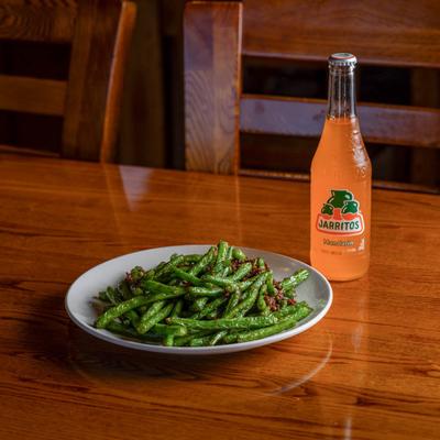 Stir fried green bean and a drink.