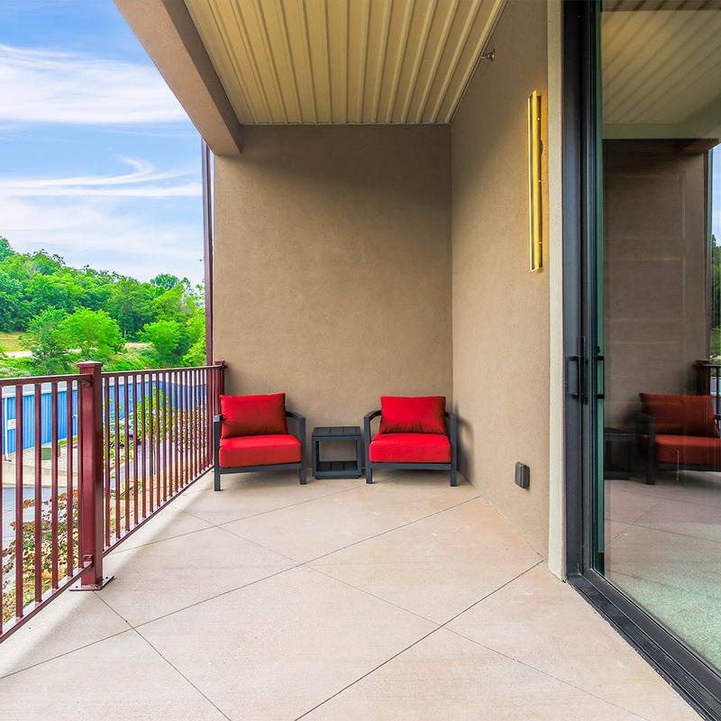 Armchairs on a balcony.
