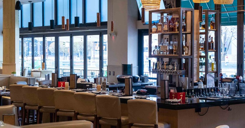 A  high bar table for dinner and chairs set