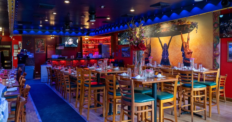 Spacious restaurant interior dining area with set dining tables