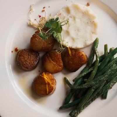 Seared scallops, with green beans and mashed potatoes.