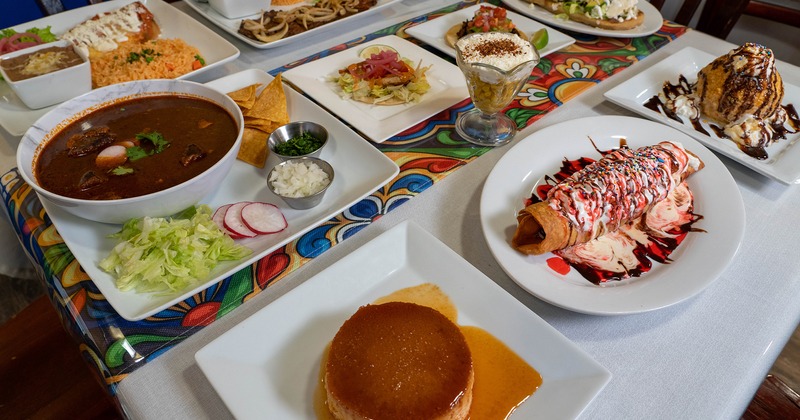 Various types of dishes served on a table