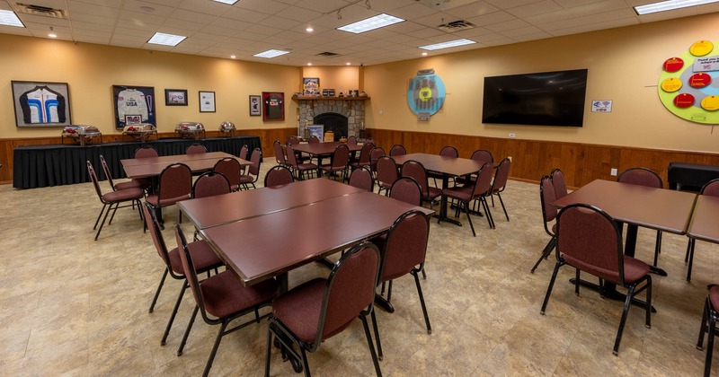 Seating area with large TV screen on the wall