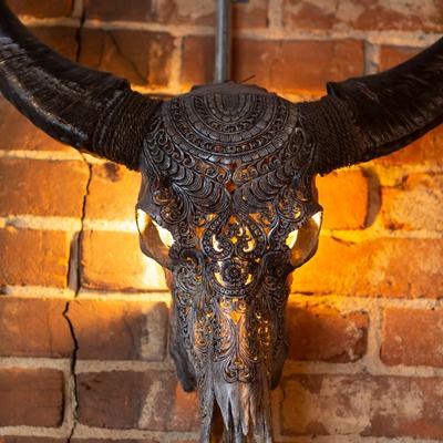 Interior, wall decoration, carved cow skull