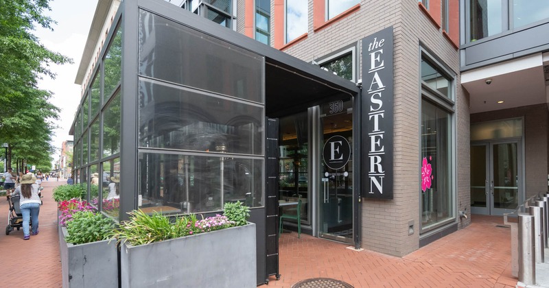 Exterior of The Eastern restaurant with a sidewalk view