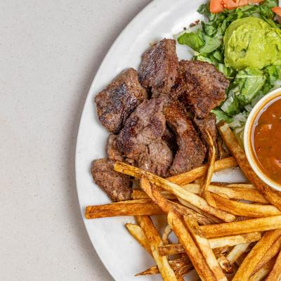 Beef sirloin, drunken beans, home style fries, guacamole.